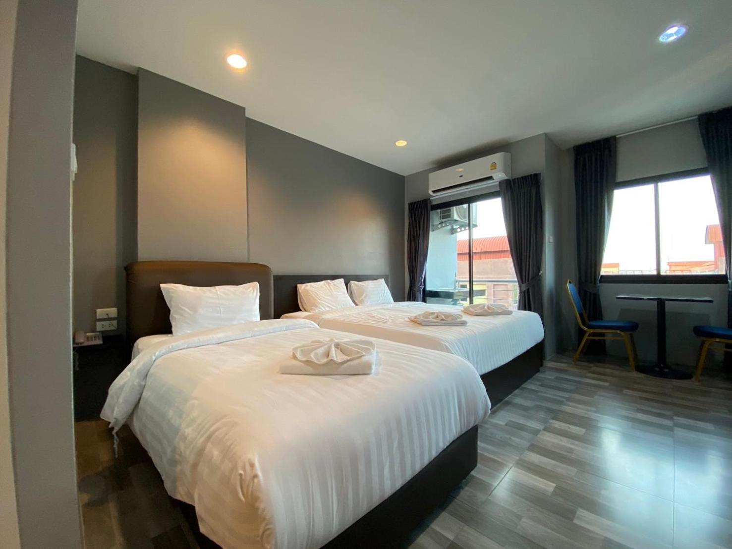 Grand Inter Hotel Samut Sakhon Phòng bức ảnh